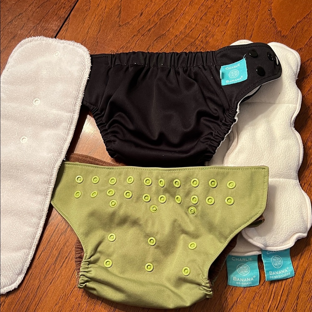 Lot of 2 cloth pocket diapers with inserts - Charlie banana and Nicki’s diapers